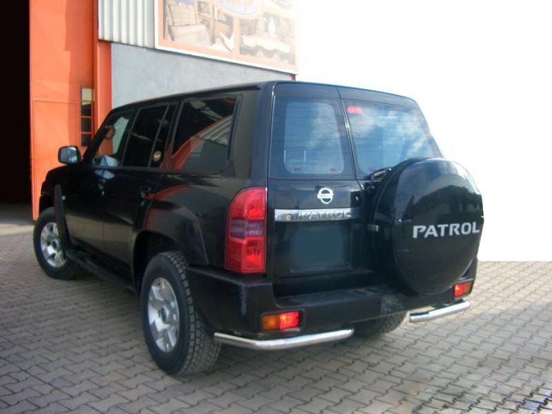 Купить Задние углы AK003 (2 шт, нерж.) для Nissan Patrol Y61 1997-2011 гг