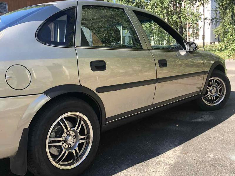 Купити Накладки на арки (4 шт, чорні) ABS пластик для Opel Vectra B 1995-2002 рр