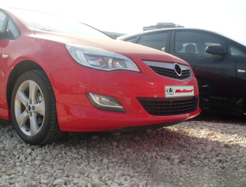 Купити Передня нижня накладка 2010-2012 (під фарбування) для Opel Astra J рр