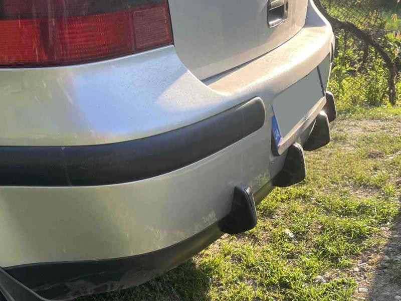 Купити Універсальний задній дифузор тип-D (4шт, чорний глянець, ABS-пластик)