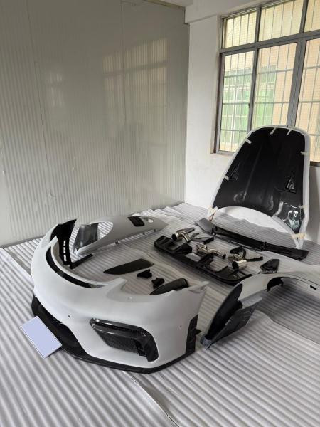 Купити Комплект обвісів GT4 (ABS -2025 Карбон) для Porsche Boxster/Cayman 982 (718) 2016- рр