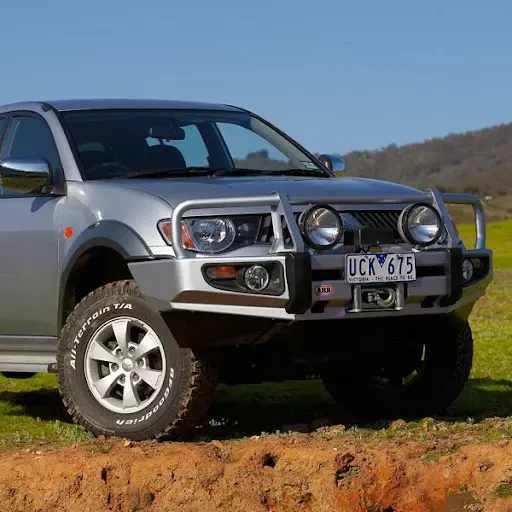 Buy Front bumper Winch Delux for Mitsubishi L200 2006-2009 Arb3446300